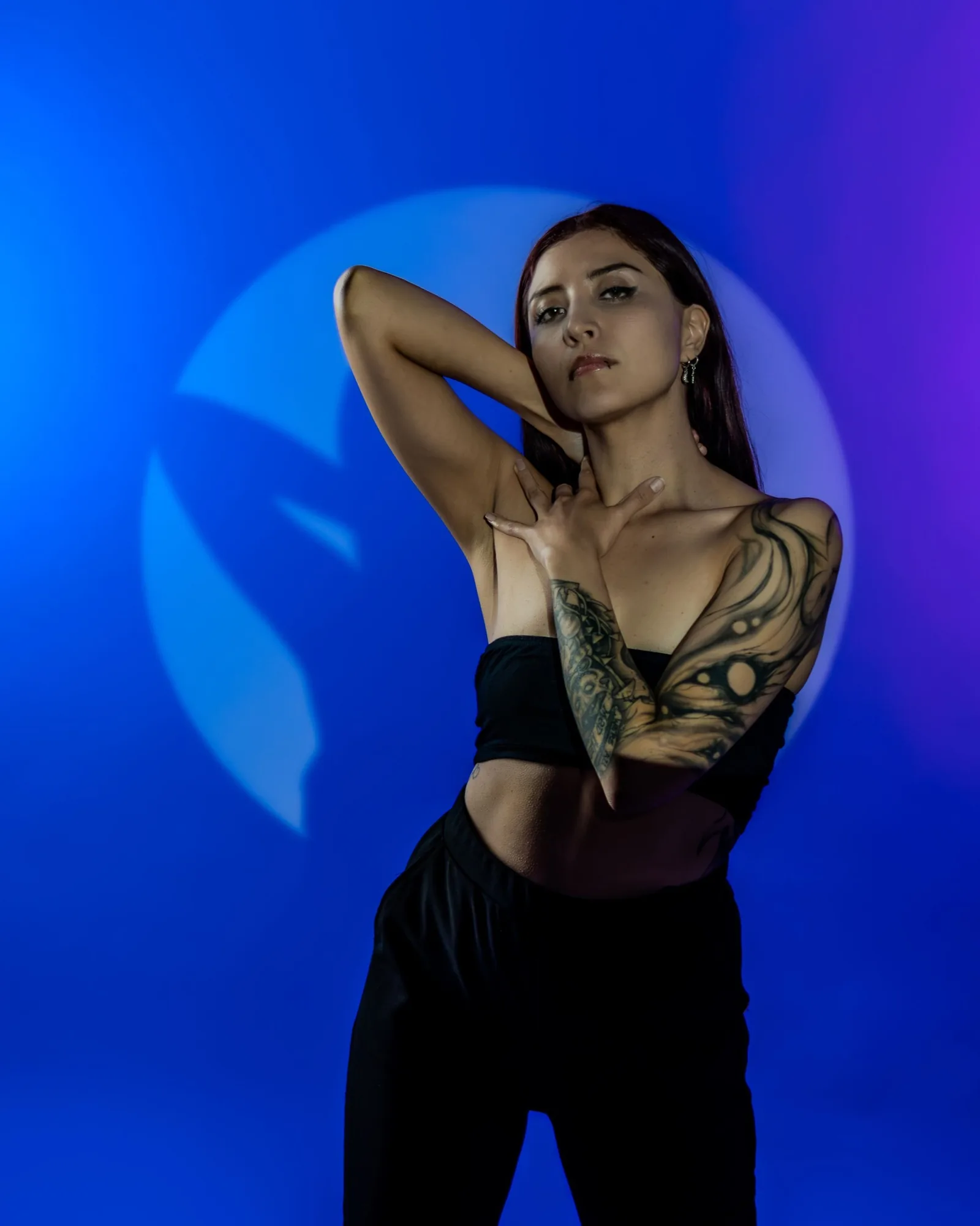 Editorial: model in blue studio light