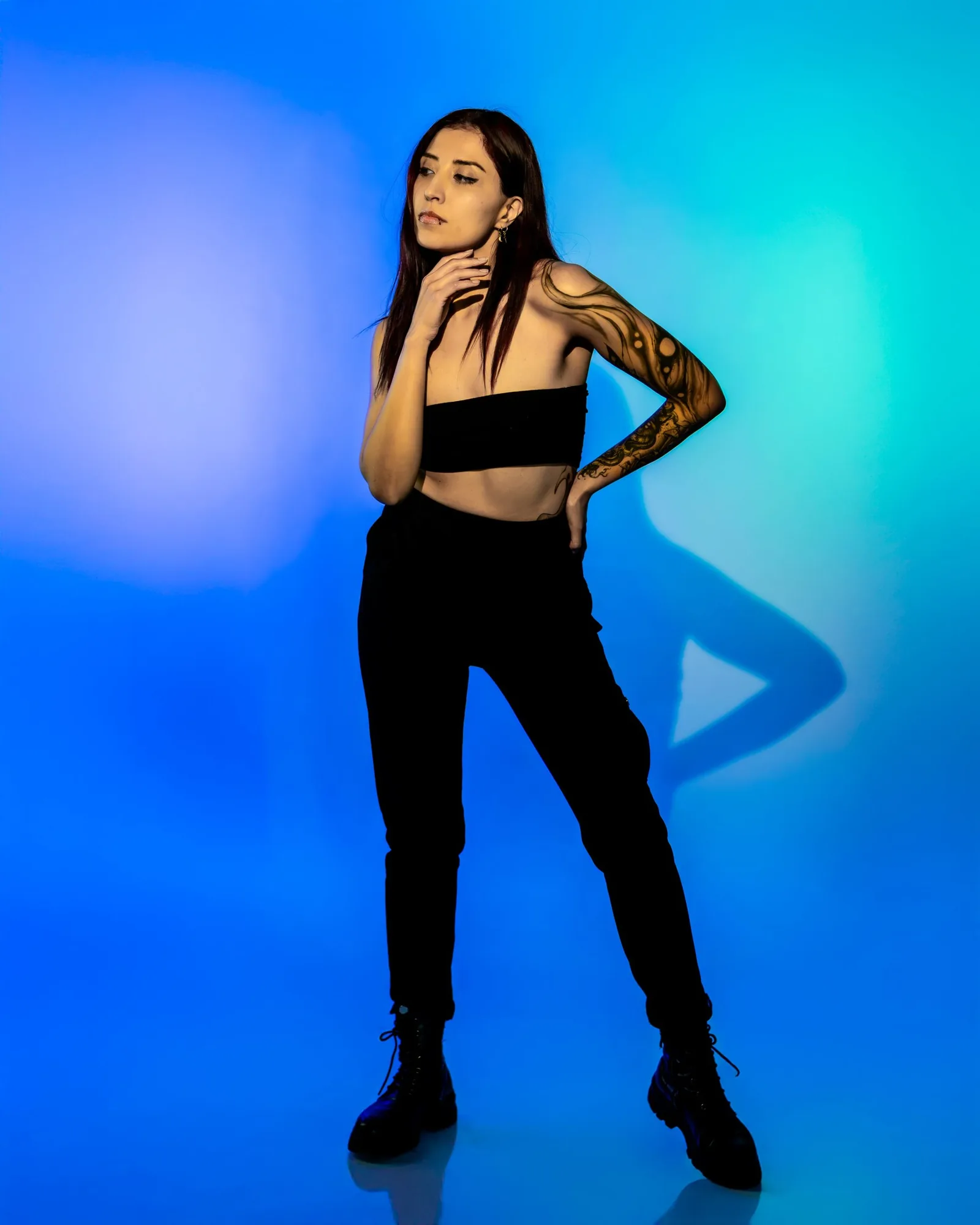 Full length shot of the model in blue light