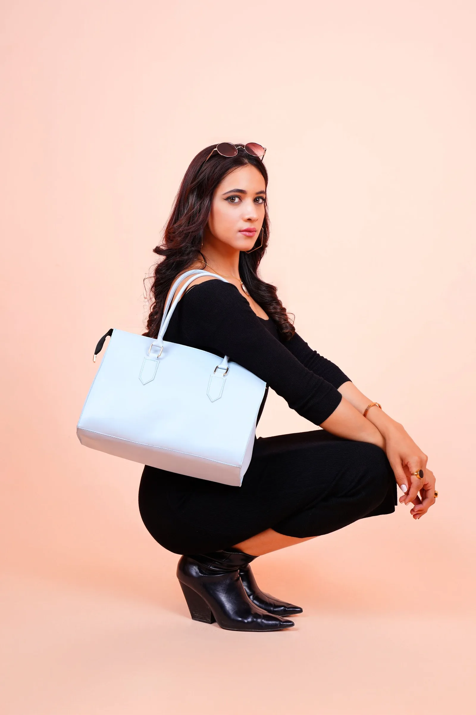 Lookbook: model with a pale blue handbag